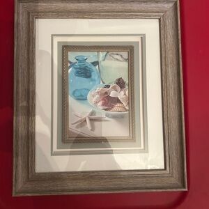 Nautical Seashell Art with Blue and Brown Frame